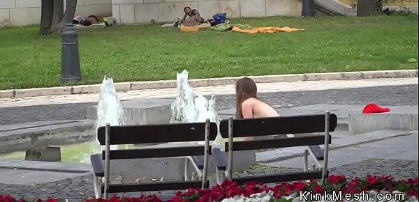  Busty slave bathing in fountain outdoor